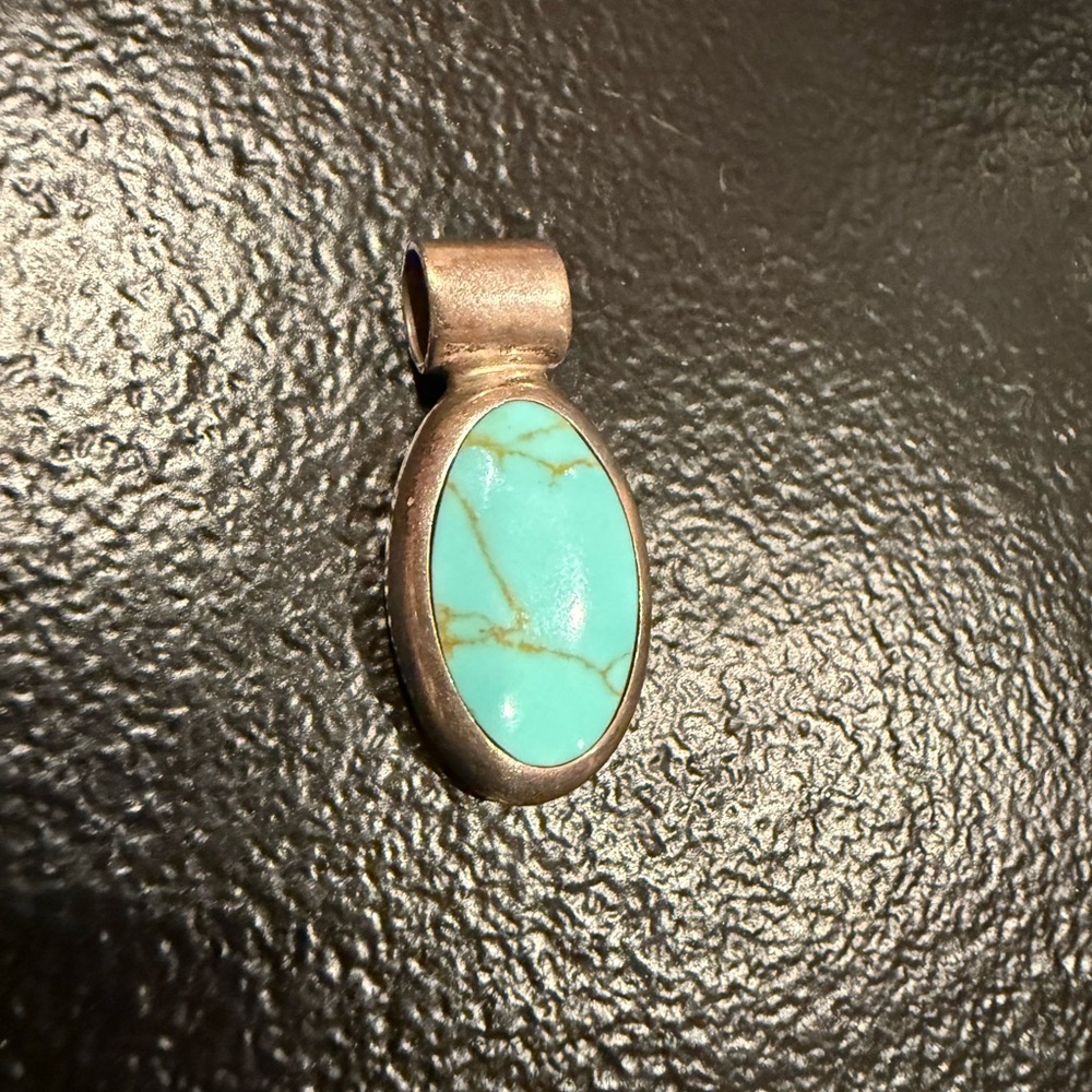 Sterling silver and turquoise signed pendant
